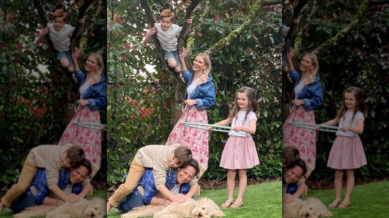 Scott and Kelley Wolf pose with their kids in nature