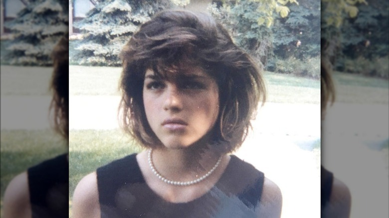 Teen Selma Blair with serious expression