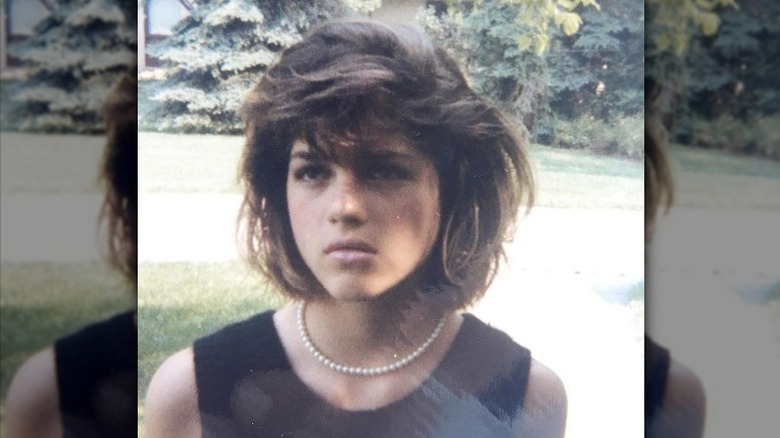 Teen Selma Blair with serious expression