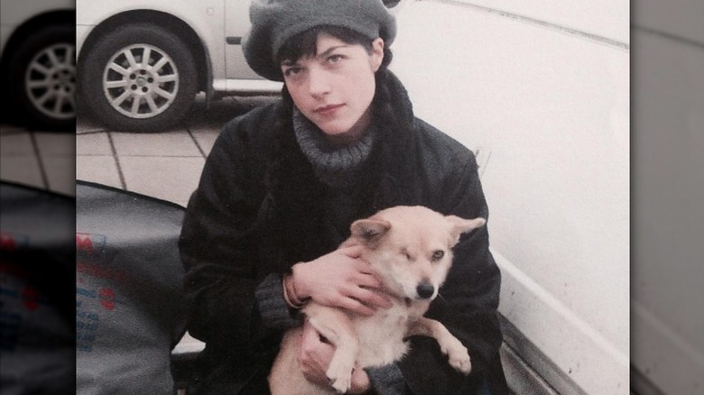 Selma Blair holding a dog