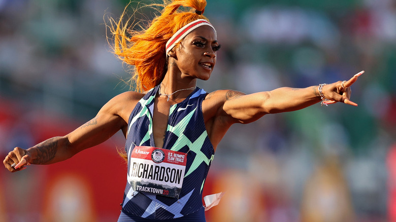 Sha'Carri Richardson pointing while running