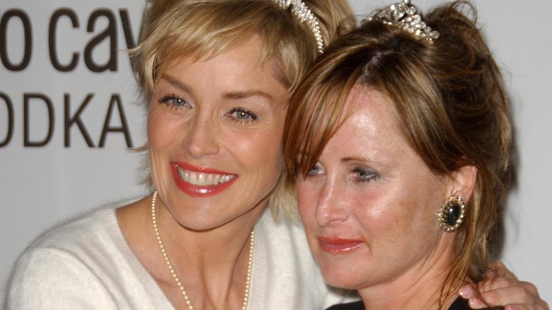 Sharon Stone and her sister Kelly hugging 