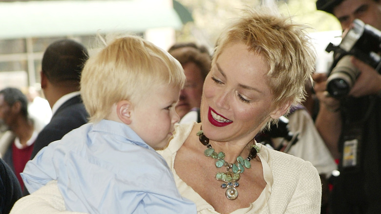 Sharon Stone cuddling her son