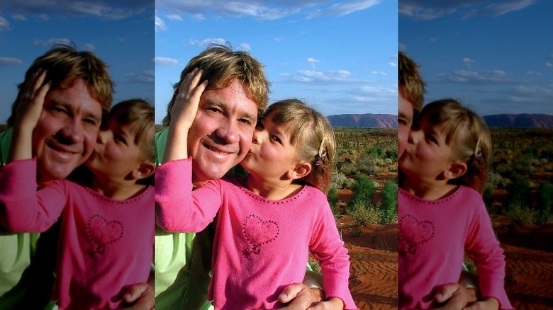 Young Bindi kisses Steve Irwin on the cheek