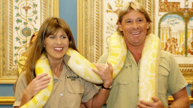 Terri and Steve Irwin holding a snake