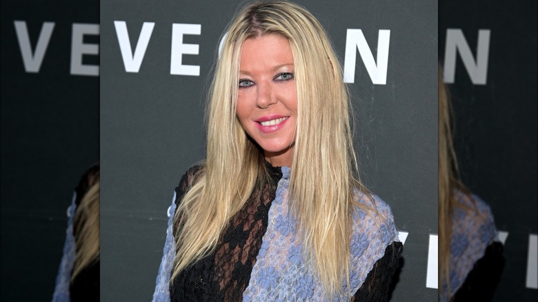Tara Reid posing at an event