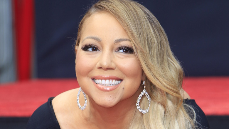 Mariah Carey smiling diamond earrings