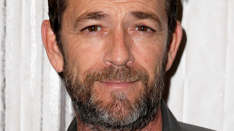 Luke Perry looking at camera