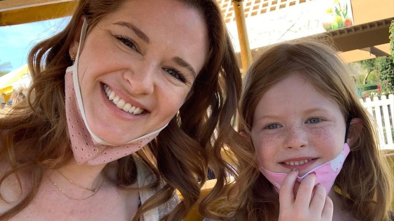 Sarah Drew and daughter Hannah Lanfer smiling 
