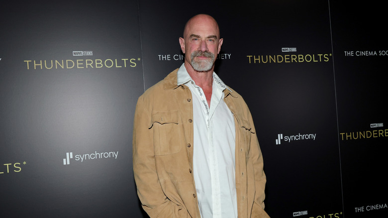 Christopher Meloni wearing a tan jacket