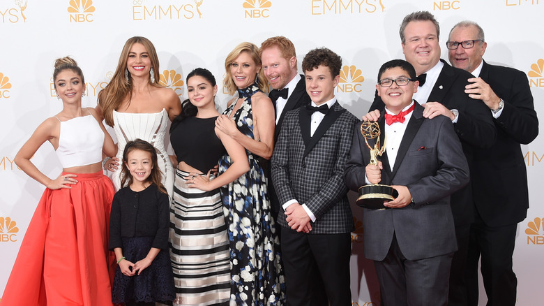 The cast of Modern Family posing together at the 66th Annual Primetime Emmy Awards