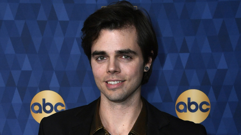 Reid Ewing posing at ABC Television's Winter Press Tour 2020