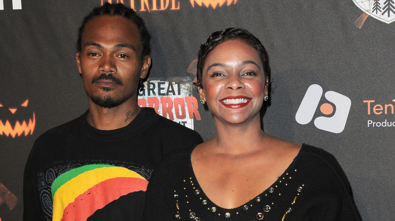 Jimmy Green and Lark Voorhies posing