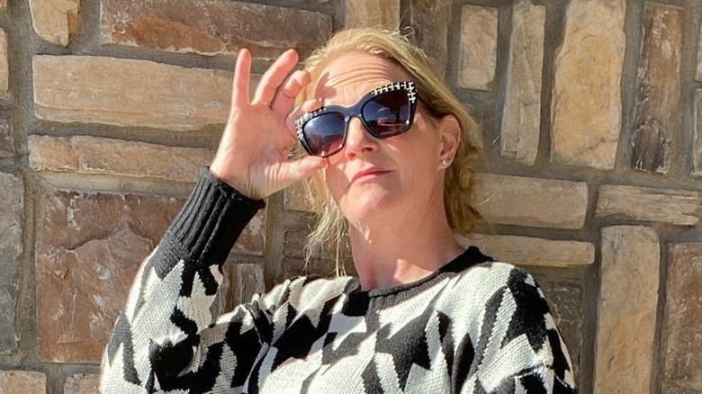christine brown posing with sunglasses