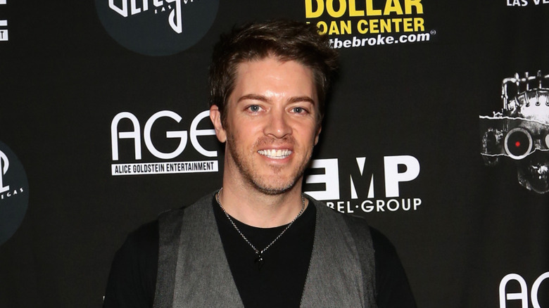 J.D. Scott posing at an event.