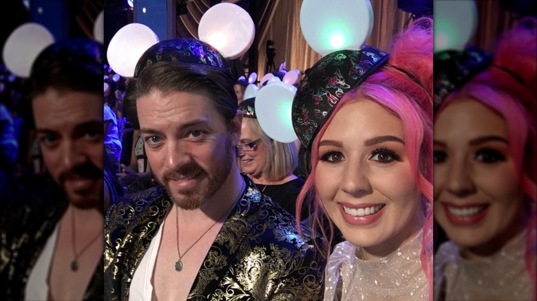 J.D. Scott and Annalee Belle pose together in Disney hats.
