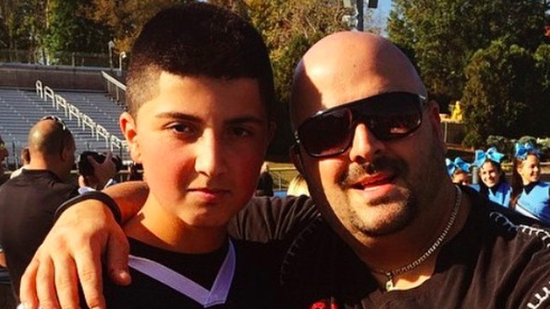 Johnny Karagiorgia poses with his son Niko