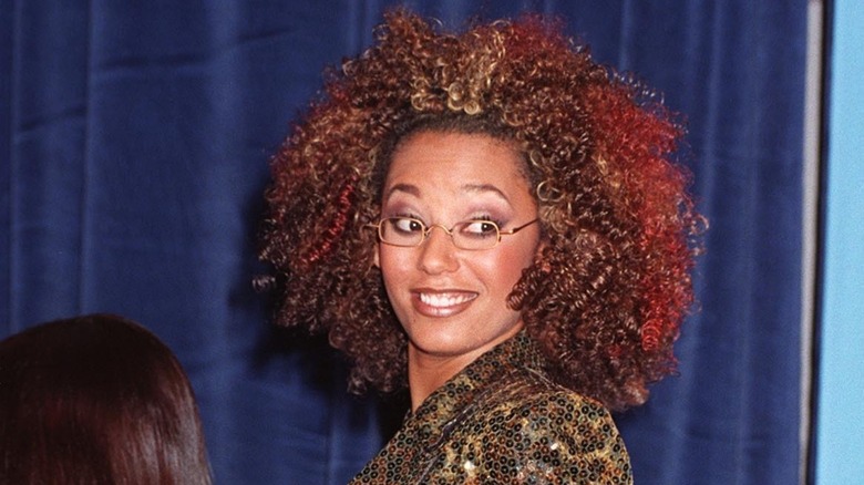 Melanie Brown smiles back stage
