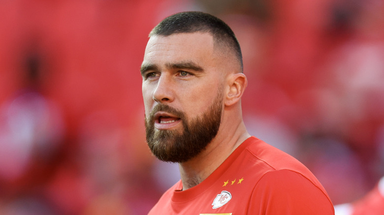 Travis Kelce warming up