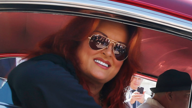 Wynonna Judd wearing sunglasses