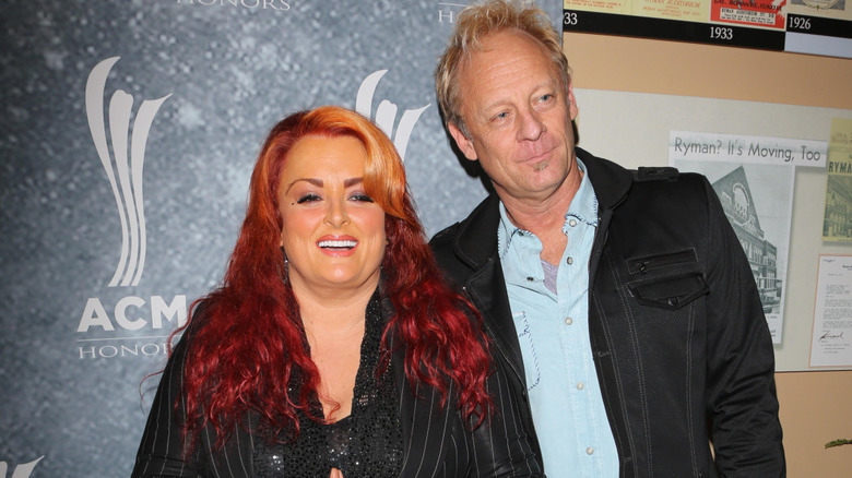 Wynonna Judd and Cactus Moser posing together