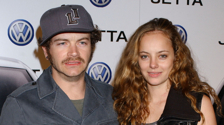 Danny Masterson frowning, Bijou Phillips smiling