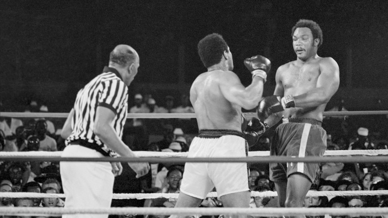 Muhammad Ali and George Foreman in a boxing match