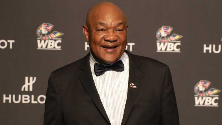 George Foreman on red carpet wearing a tuxedo