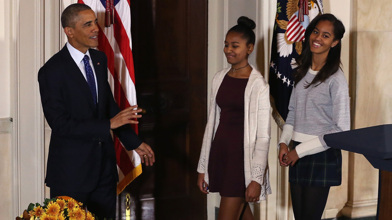 Barack, Sasha and Malia Obama at the 2014 turkey pardon