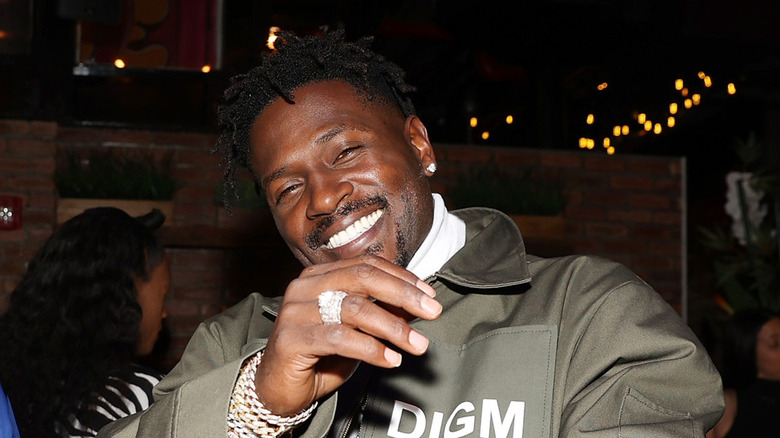 Antonio Brown posing for a photo in a DIGM