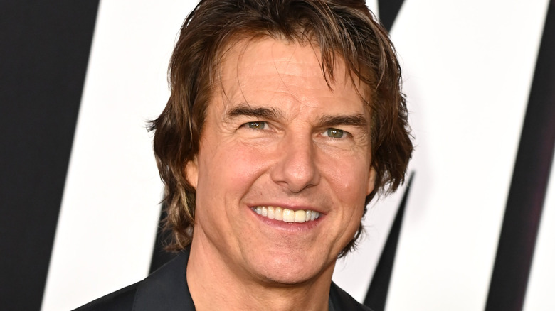 Tom Cruise smiling with teeth exposed