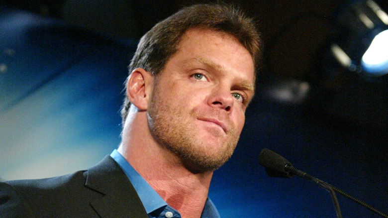 Chris Benoit speaking at a press event in 2004