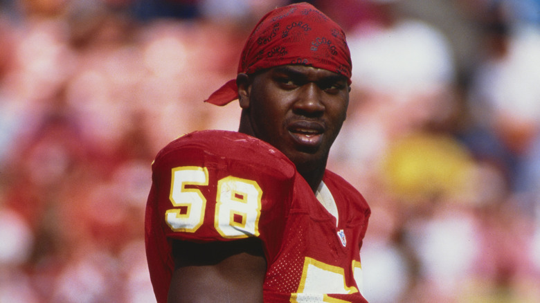 Derrick Thomas looking on