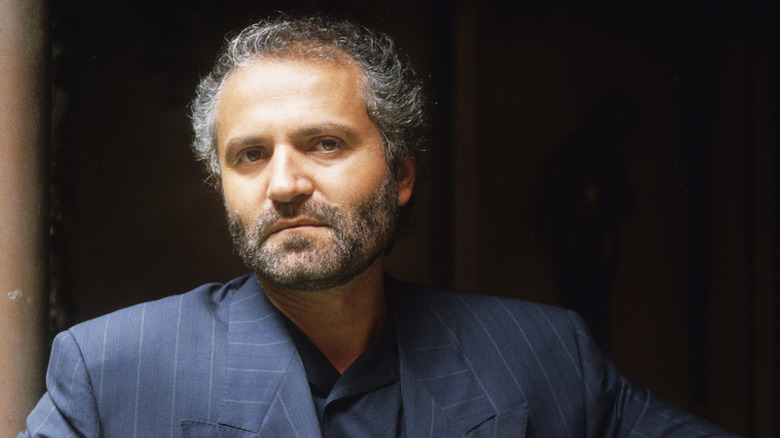 Gianni Versace posing