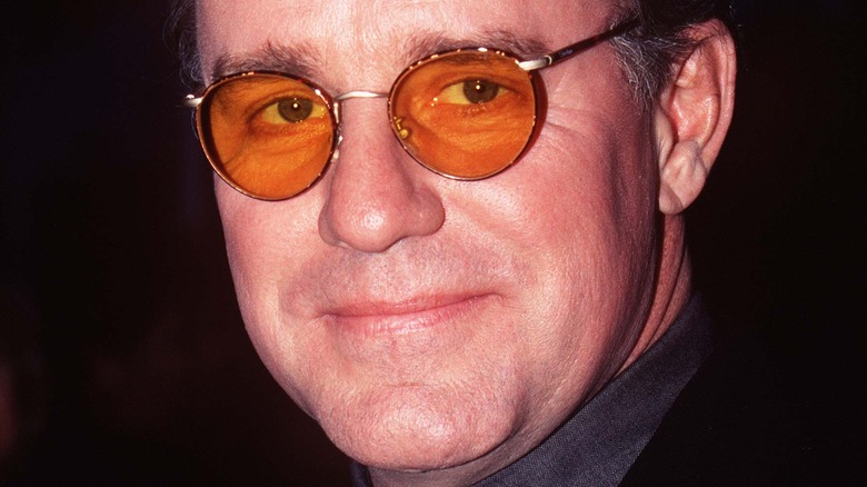 Phil Hartman glasses, smiling