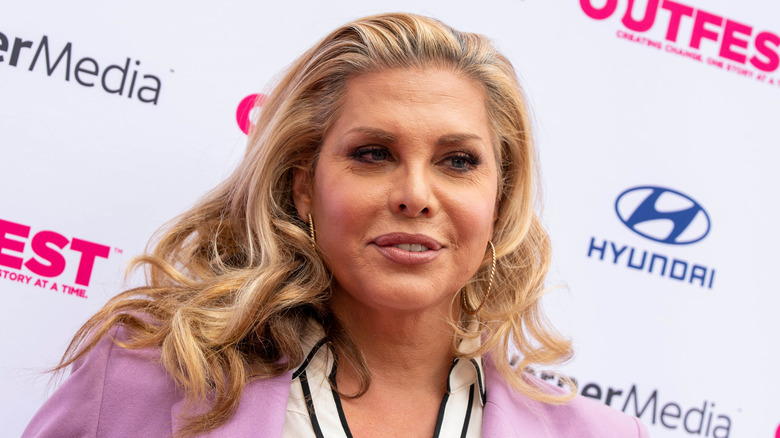 Candis Cayne posing at an event