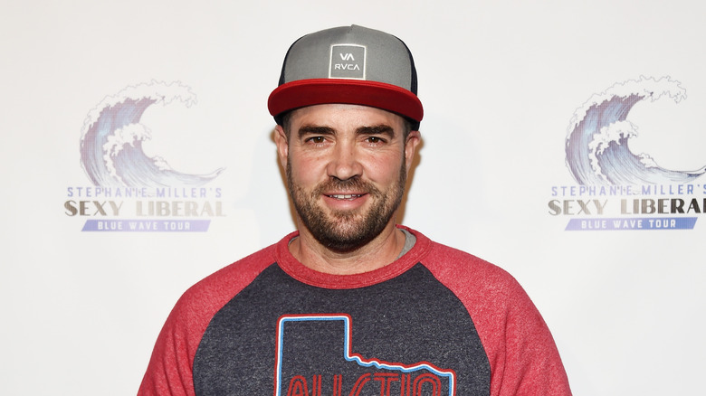 Ian Harvie posing at an event