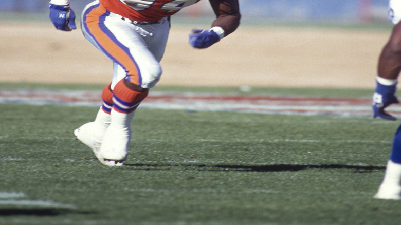 Shannon Sharpe playing for the Denver Broncos