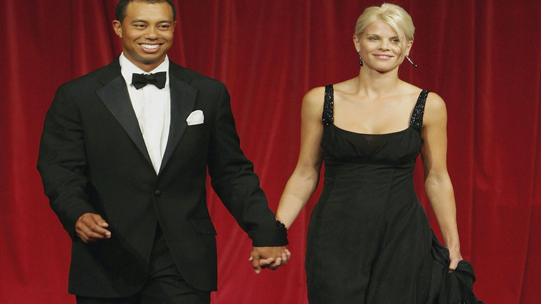 Elin Nordegren and Tiger Woods smiling