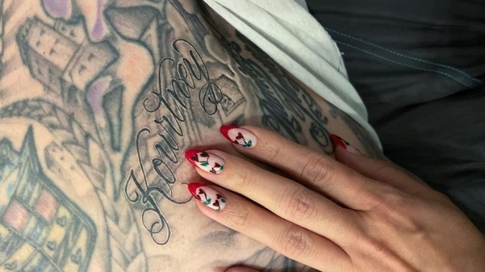 Travis Barker Kourtney Kardashian tattoo
