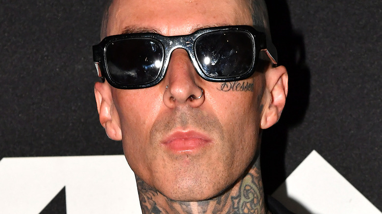 Travis Barker wearing sunglasses