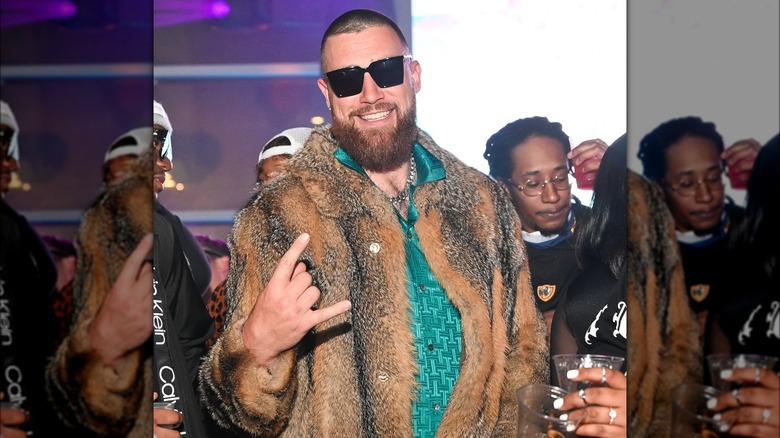 Travis Kelce wearing fur coat