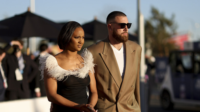 Travis Kelce walking with Kayla Nicole