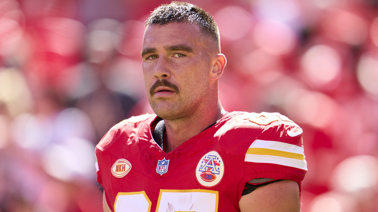 Travis Kelce wearing a jersey