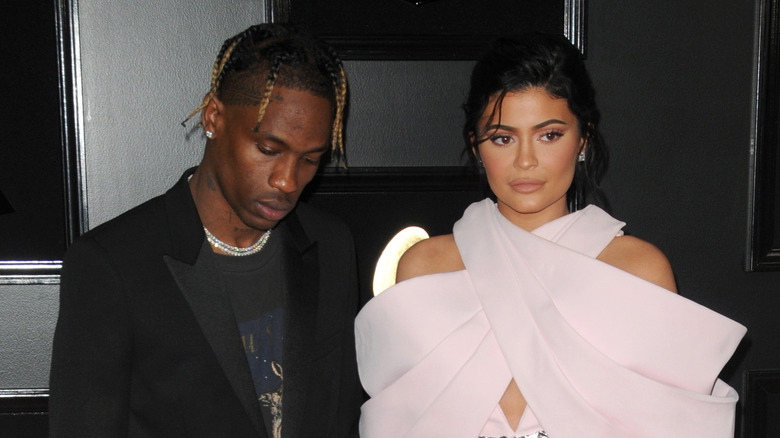 Kylie Jenner and Travis Scott posing
