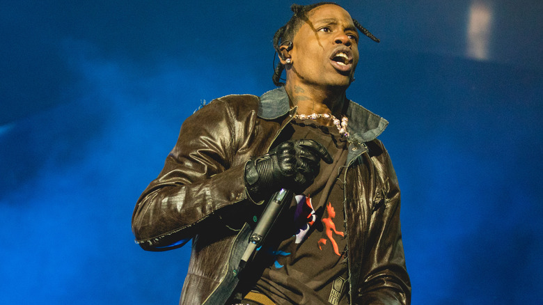 Travis Scott performing on stage