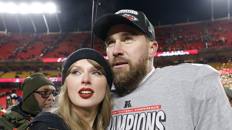 Taylor Swift and Travis Kelce pose at the 2025 Super Bowl