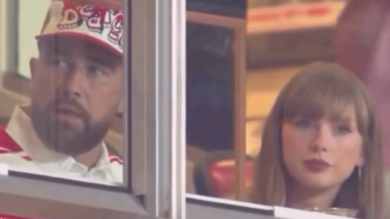 Taylor Swift sits next to Travis Kelce during Cincinnati-Cornhuskers game