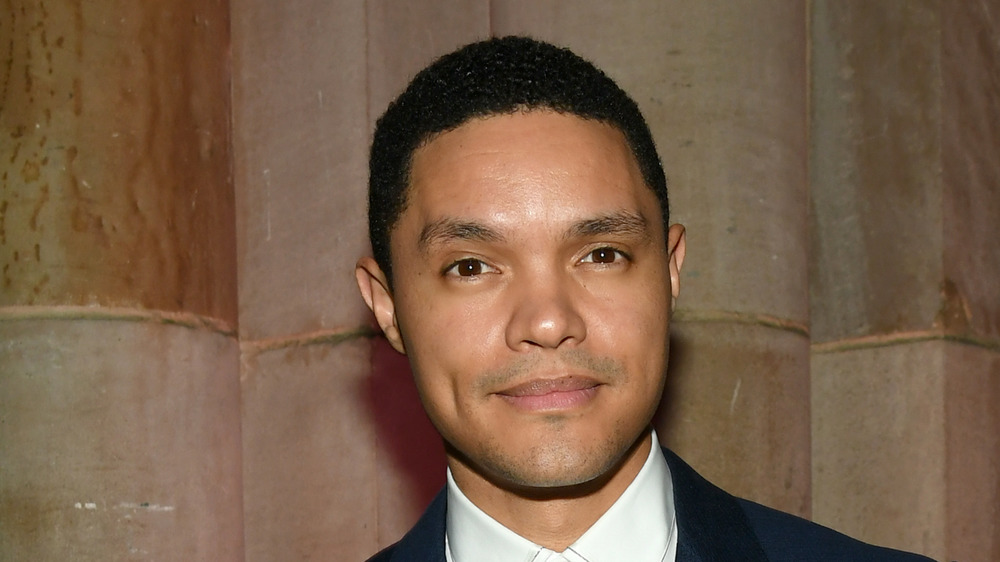 Trevor Noah stares at camera