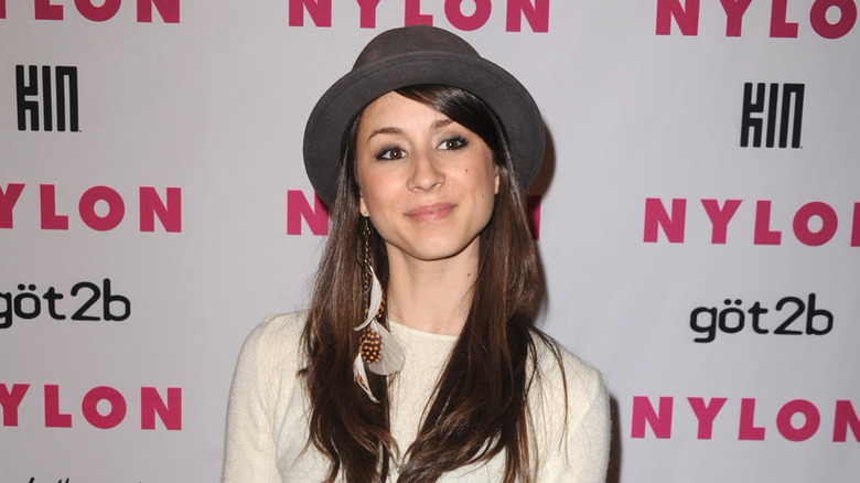 Troian Bellisario posing